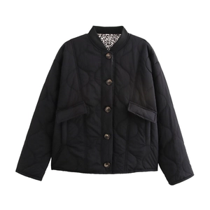 Women's black quilted jacket with leopard lining and stand collar in loose fit design