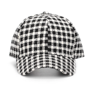 Plaid wool blend baseball cap with black and white checkered pattern for winter warmth