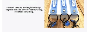 Blue soft rubber astronaut strap keychain with stars and sleek metal ring detail