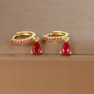 Detailed view of S925 silver needle drop earrings with red crystal pear-shaped charms