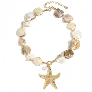 Bohemian gold starfish necklace with natural shell fragments and elegant pearl charm