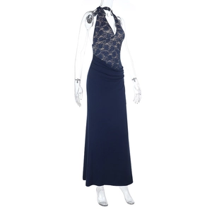 Close-up of dark blue lace halter neck bodice with elegant sheer floral embroidery details