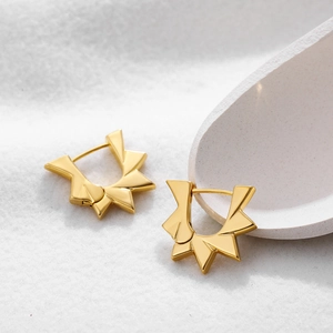 Modern 18K gold plated stainless steel gear earrings with irregular starburst design