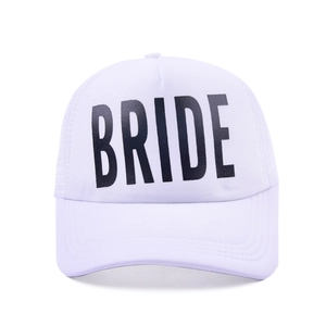 Detailed front view of white mesh trucker hat featuring bold black BRIDE lettering