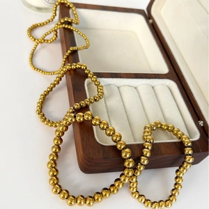 Set di bracciali a sfere in acciaio inossidabile placcato oro 18K su scatola in legno