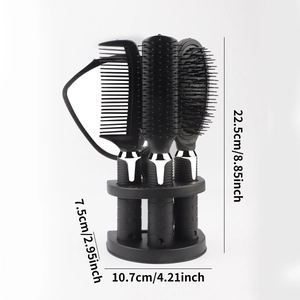 Detailed dimensions of 4-piece black hairbrush set with stand on white background