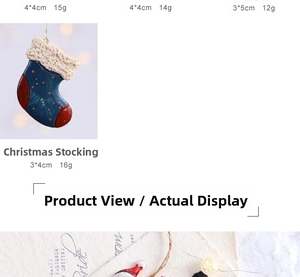 Macro view of blue resin Christmas stocking pendant with white textured trim and polka dots