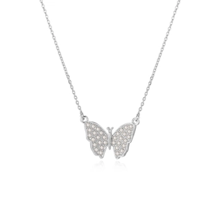 Close-up of elegant silver bow necklace featuring intricate pearl inlay on butterfly wings