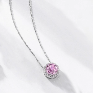 Luxurious S925 silver necklace with a large round pink zircon pendant and micro-set halo