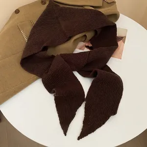 Deep brown hooded knit scarf with ribbed texture for winter warmth and ear protection