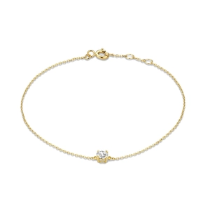 Detail of a minimalist gold bracelet featuring a single round zircon and spring clasp
