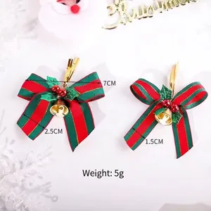 Festive Christmas bow with green and red stripes, gold bells, and holly leaf details