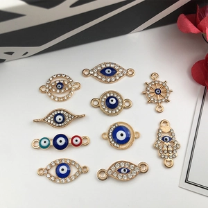 Golden Evil Eye charms set with colorful enamel and crystals for DIY jewelry making