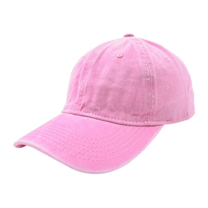 Detail of pink washed cotton baseball cap showing vintage texture and stitching