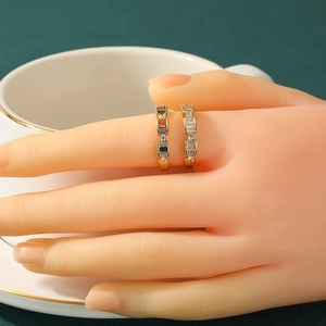 Adjustable copper rings with colorful and white rectangular zircons on model hand