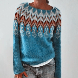 Detailed view of the vintage blue jacquard knit sweater with brown wavy patterns