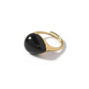 Minimalist gold-plated stainless steel ring featuring a large black teardrop stone