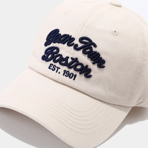 Detail of vintage cream baseball cap with navy blue Bean Town Boston 1901 embroidery