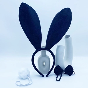 Three-piece bunny girl set with black velvet ears, matching bowtie and white plush tail