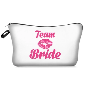 White Team Bride canvas makeup bag with pink lettering and red lips for wedding party