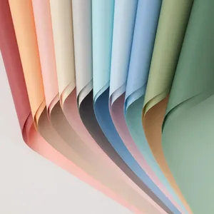 Detailed fanned out view of colorful Morandi stone texture paper for gift wrapping