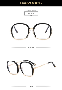 Detail of round frame glasses with black gold metal bridge and anti-blue light lenses