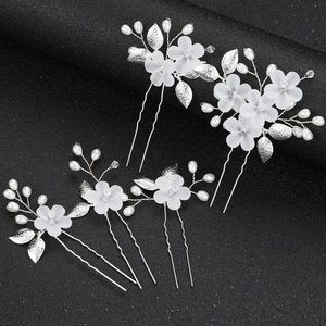 Bruidshaarspeldenset met zilveren bloemen en witte parels voor elegante bruidskapsels