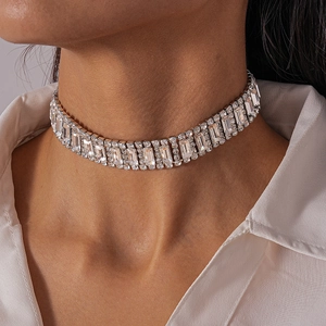 Macro shot of silver-tone choker featuring luxury rectangular-cut rhinestones and crystals