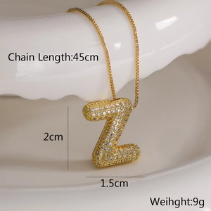Detail view of gold letter Z pendant with zircon inlay showing 45cm chain length