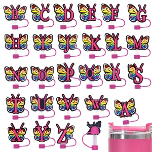 Grid display of 26 rainbow butterfly straw toppers featuring A-Z letters on silicone caps