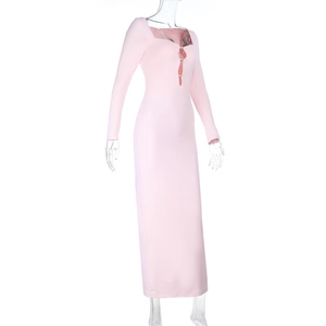 Detail of pink long-sleeve slim-fit dress with button accents and square neck design