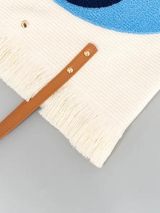 Bohemian canvas tote bag with blue chenille embroidery and tassel fringe details