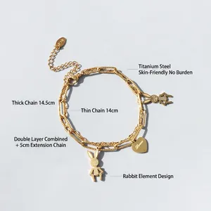 Double-layered 18K gold titanium steel bracelet featuring rabbit and heart pendants