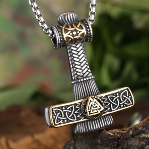 Viking Thor's Hammer pendant necklace with Celtic knot patterns in silver and gold tone