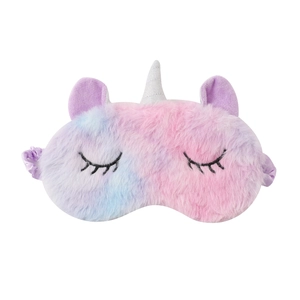 Detail of plush unicorn sleeping mask with glitter horn and cute embroidered eyes