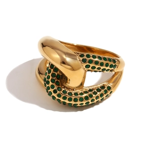 Cross knotted 18K gold plated ring with green zircon stones on a white background