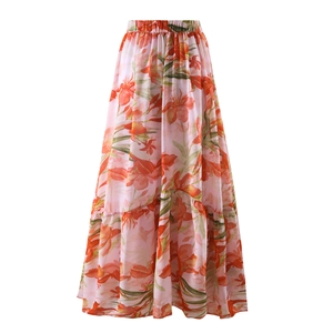 Close-up of lightweight floral maxi skirt with tiered hem and pink tulip pattern print