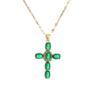 Gold cross necklace with green gemstones and zircon on flat herringbone chain
