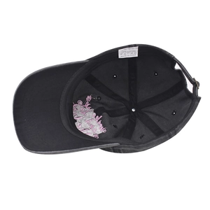 Detail view of the washed cotton baseball cap interior with stitching and sweatband