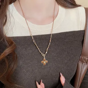 Tiger eye and pearl flower pendant necklace in gold for women's vintage style look