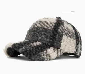 Detail of warm beige lamb wool baseball cap with marble texture and soft fluffy fabric