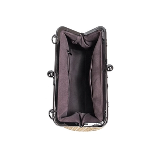 Internal view of a retro PU handbag with deep purple lining and functional pockets