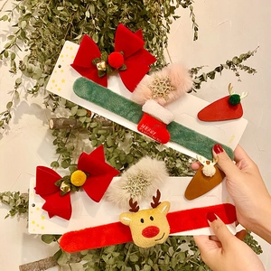 Christmas hair clips and slap bracelets set with festive velvet and faux fur textures
