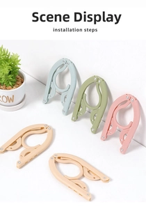 Close-up of portable folding hangers in Morandi colors for travel and space-saving use