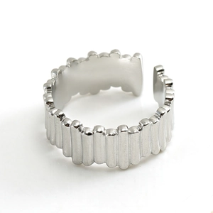 Irregular silver stainless steel open ring with vertical textured prism pattern