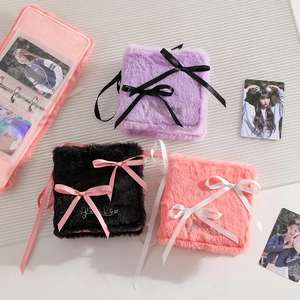 Plush ballet style photo album binders in pink, purple and black with ribbon ties