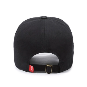 Rear view of black cotton baseball cap with adjustable bronze metal buckle and red label tag