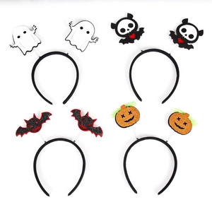 Set of four Halloween headbands featuring pumpkin, bat, ghost, and heart spring designs