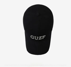 Top view of black cotton baseball cap with GUZF rhinestone lettering embroidery