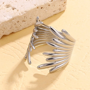 Irregular silver multilayer open ring with radial wing pattern for a modern bold style